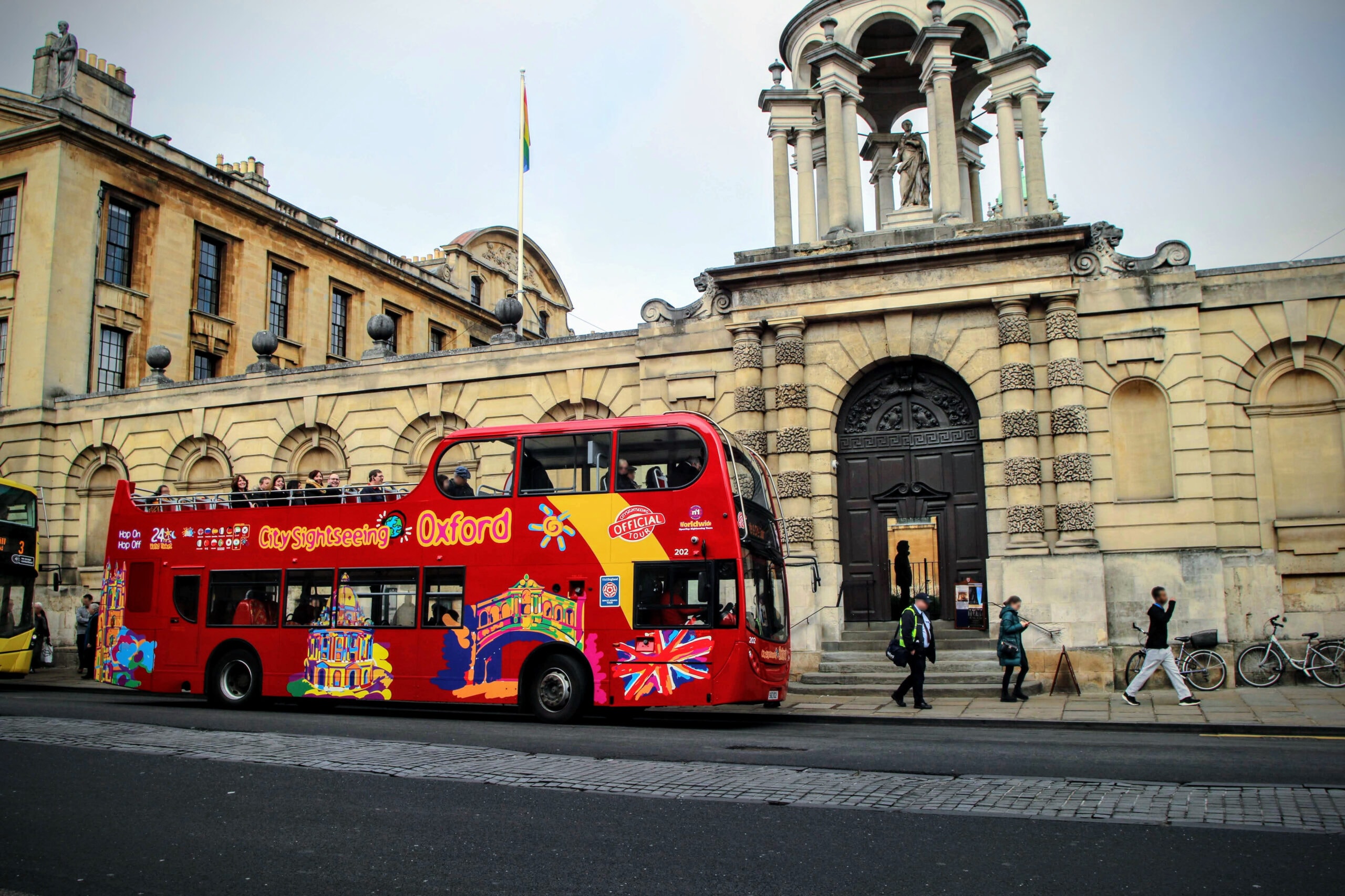 Oxford City Sightseeing Tour bus at Queens Lane in Oxford