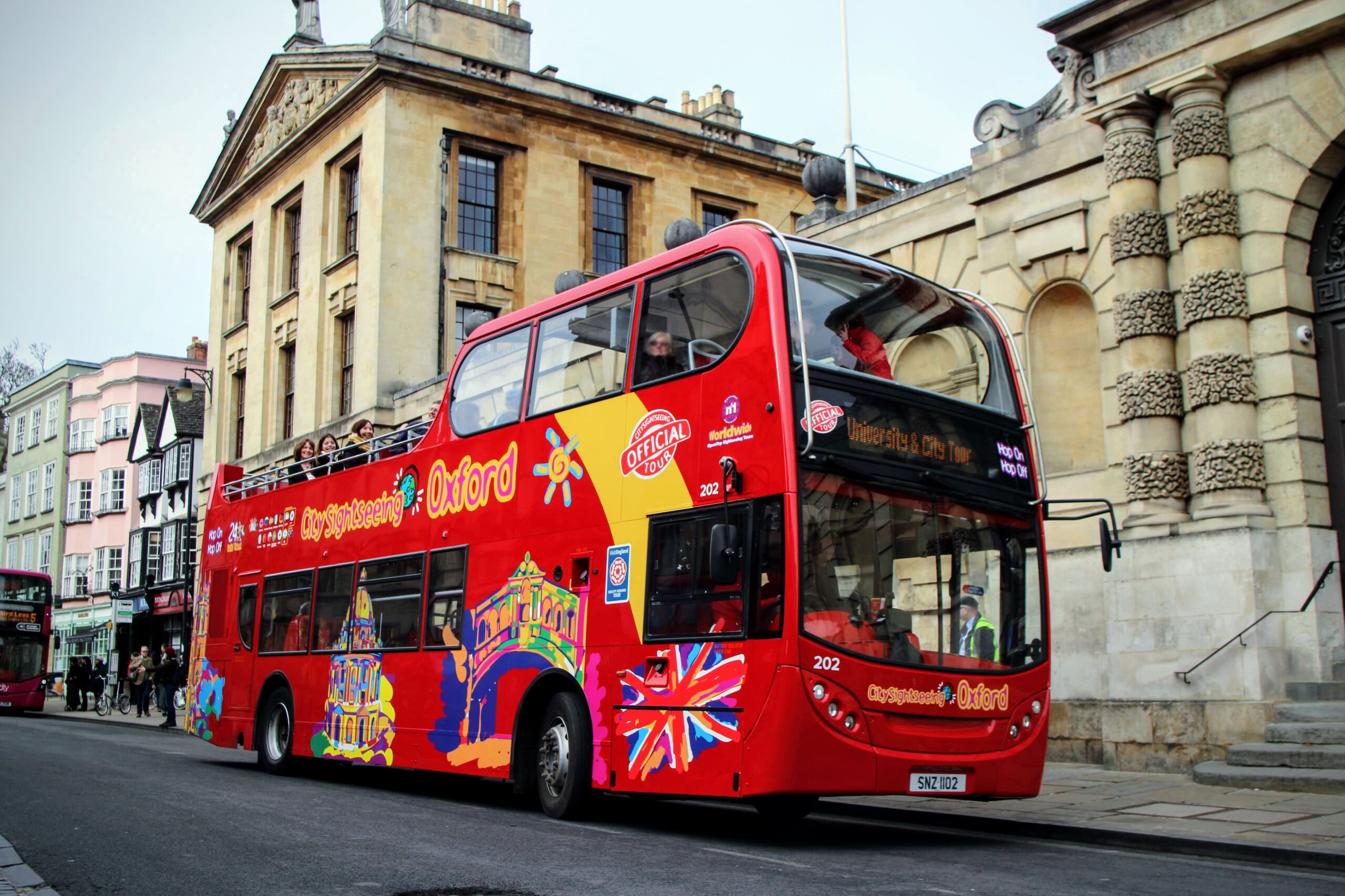 Oxford City Sightseeing Tour bus at Queens Lane in Oxford